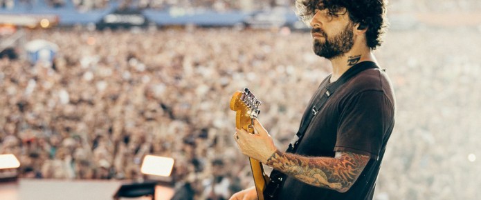 Why is Fall Out Boy guitarist Joe Trohman stepping away from the band?