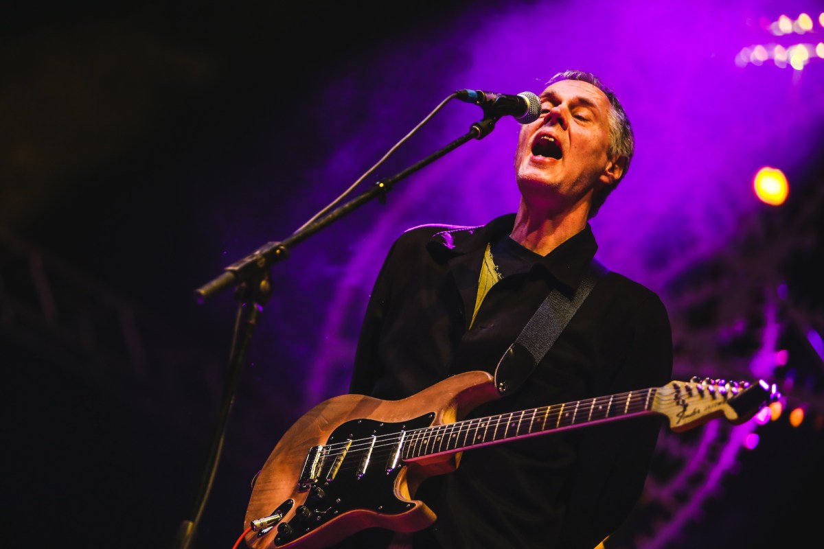 A photo of Tom Verlaine performing with his band Television at Fun Fun Fun Fest in Austin, TX on November 9, 2013. He plays a Fender Jazzmaster guitar.