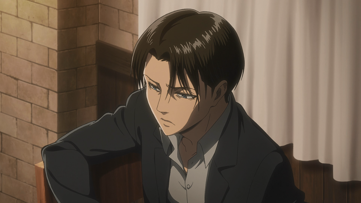 Levi Ackerman sat on a chair while looking pensive in 'Attack on Titan'.
