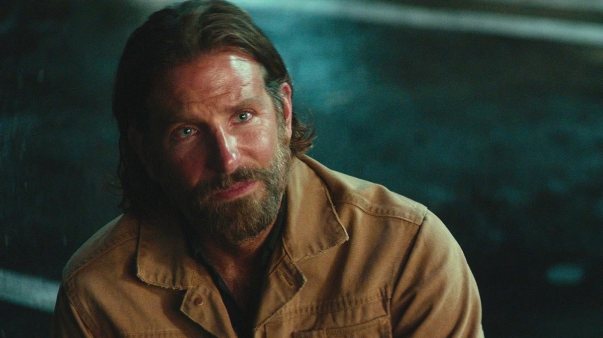 Bradley Cooper is looking at something off-camera in A Star is Born.