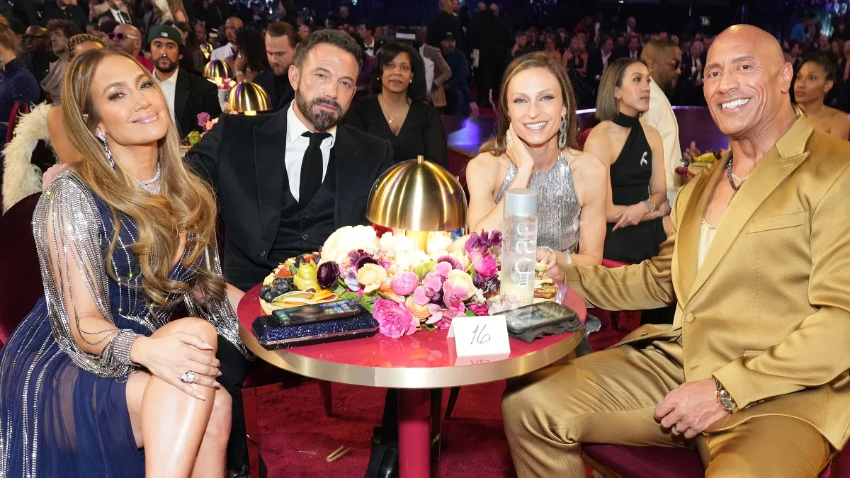 LOS ANGELES, CALIFORNIA - FEBRUARY 05: (L-R) Jennifer Lopez, Ben Affleck, Lauren Hashian, and Dwayne Johnson attend the 65th GRAMMY Awards at Crypto.com Arena on February 05, 2023 in Los Angeles, California.