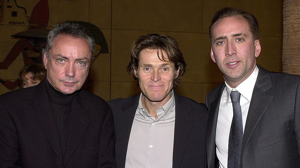 Udo Kier, left, and Willem Dafoe, center, pose with producer Nicolas Cage as they arrive at the premiere of  "Shadow of the Vampire"