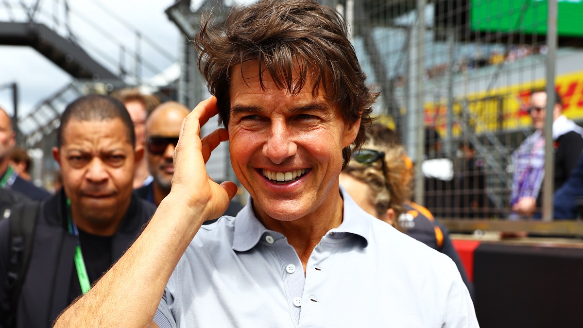 NORTHAMPTON, ENGLAND - JULY 03: Tom Cruise walks in the Paddock prior to the F1 Grand Prix of Great Britain at Silverstone on July 03, 2022 in Northampton, England.
