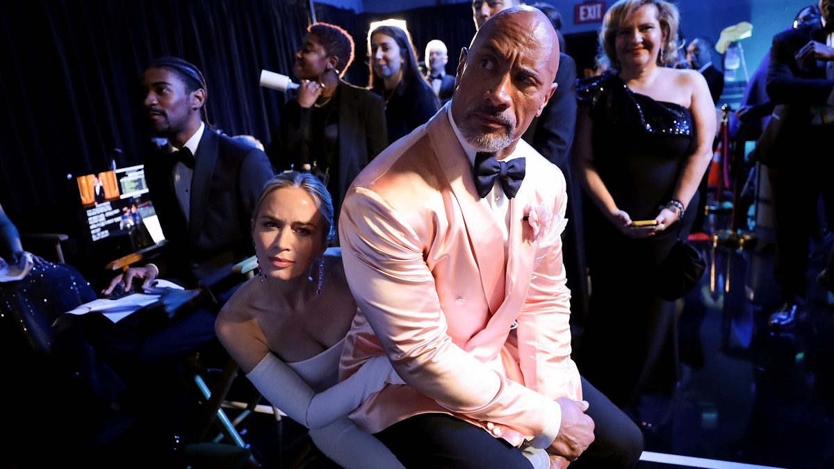 HOLLYWOOD, CALIFORNIA - MARCH 12: In this handout photo provided by A.M.P.A.S., (L-R) Emily Blunt and Dwayne Johnson are seen backstage during the 95th Annual Academy Awards on March 12, 2023 in Hollywood, California.