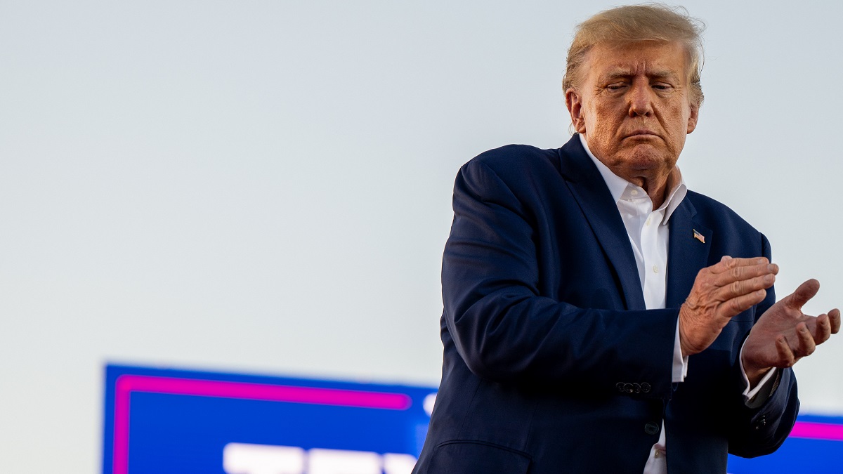 WACO, TEXAS - MARCH 25: Former U.S. President Donald Trump applauds at the conclusion of a rally at the Waco Regional Airport on March 25, 2023 in Waco, Texas. Former U.S. president Donald Trump attended and spoke at his first rally since announcing his 2024 presidential campaign. Today in Waco also marks the 30 year anniversary of the weeks deadly standoff involving Branch Davidians and federal law enforcement. 82 Davidians were killed, and four agents left dead.