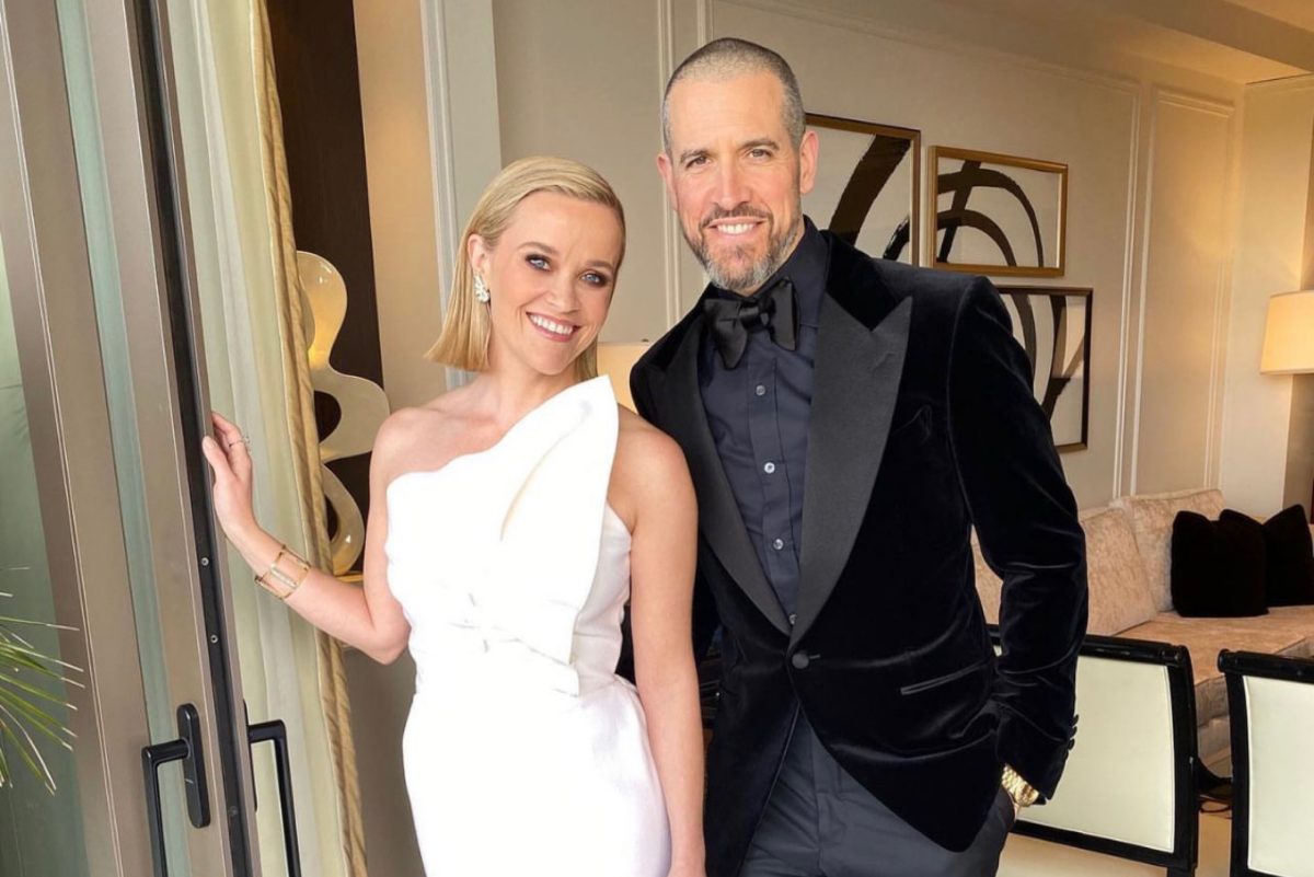 Reese Witherspoon in a white dress alongside her ex-husband Tim Toth, who is wearing a black suit