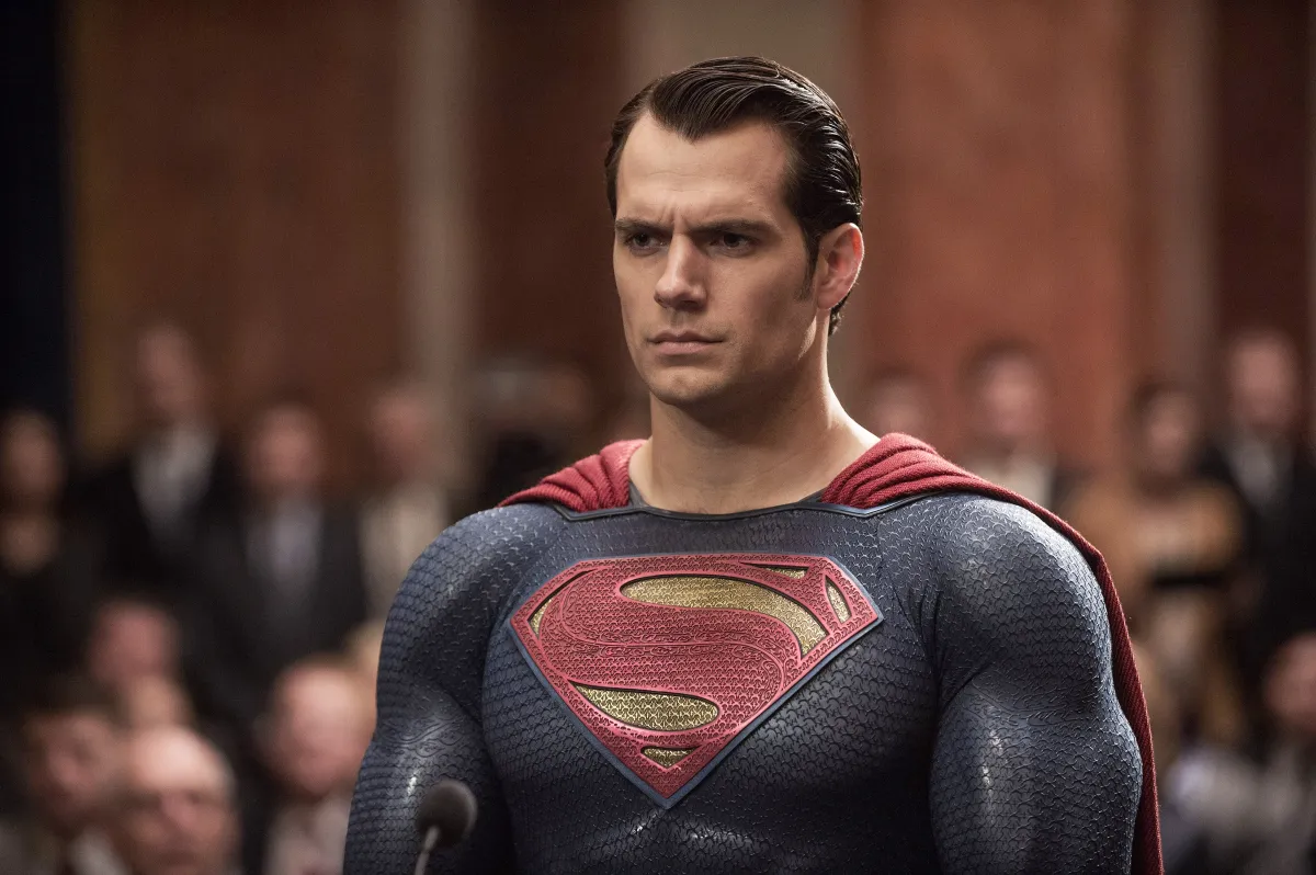 Henry Cavill as Superman is in a courtroom.