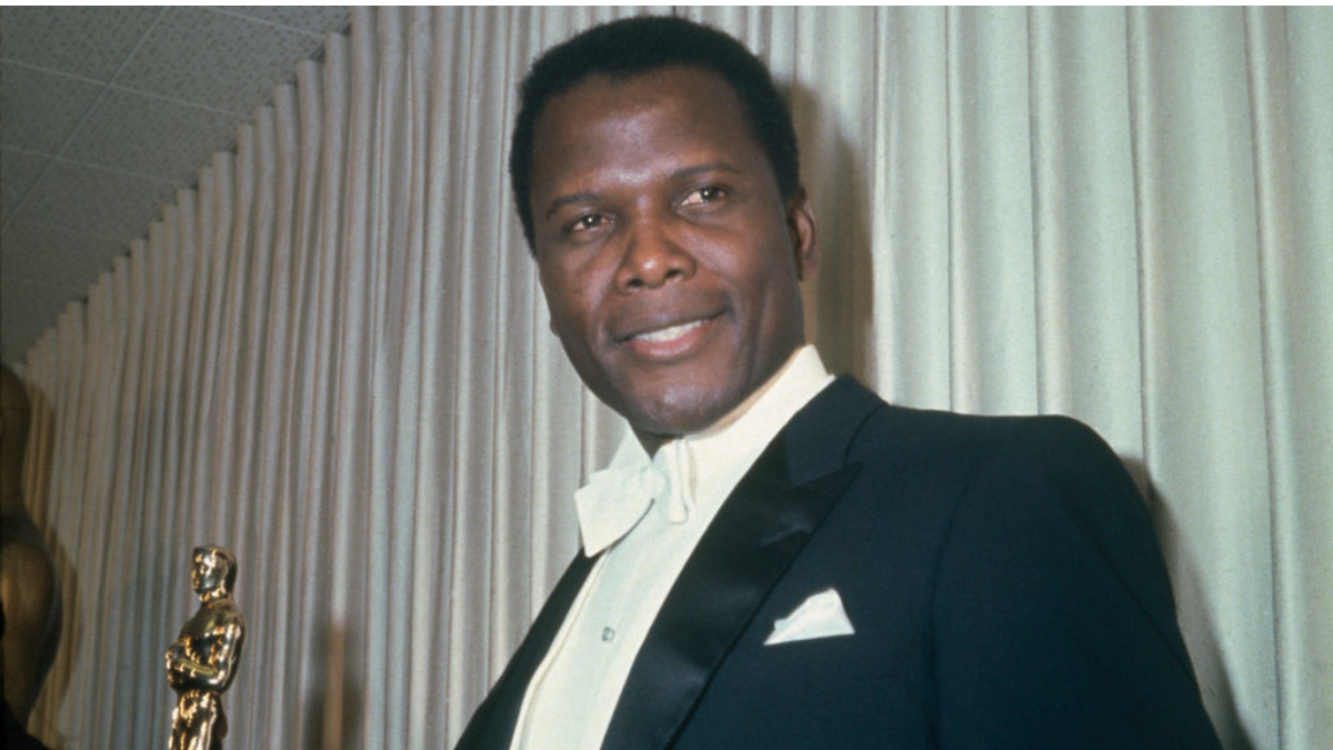 Bahamian-American actor Sidney Poitier (1927 - 2022) at the 39th Academy Awards in Santa Monica, Los Angeles, 10th April 1967. He is presenting the award for Best Supporting Actress.