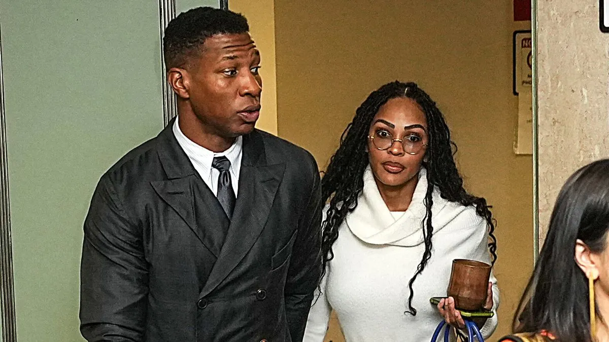 NEW YORK, NEW YORK - DECEMBER 15: Actor Jonathan Majors and Meagan Good arrive for closing arguments in Majors' domestic violence trial at Manhattan Criminal Court on December 15, 2023 in New York City. Majors had plead not guilty but faces up to a year in jail if convicted on misdemeanor charges of assault and harassment of an ex-girlfriend. 