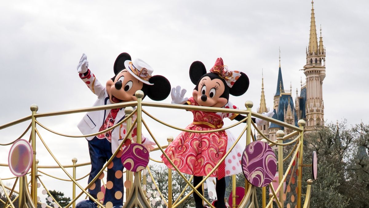 URAYASU, JAPAN - JANUARY 17: Actors dressed as Walt Disney characters Mickey Mouse (L) and Minnie Mouse (R) perform during a press preview for the "Minnie Besties Bash!" parade at Tokyo Disneyland on January 17, 2023 in Urayasu, Japan. The special event is held for 73 days from January 18 to March 31. 