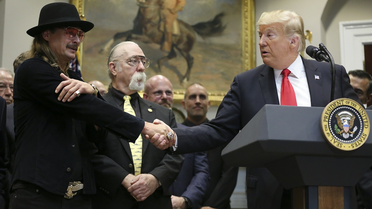 WASHINGTON, DC - OCTOBER 11: (AFP OUT) U.S. President Donald Trump shakes hands with Kid Rock prior signing a H.R. 1551, the 'Orrin G. Hatch-Bob Goodlatte Music Modernization Act' during a ceremony in the Roosevelt Room of the White House on October 11, 2018 in Washington, DC.