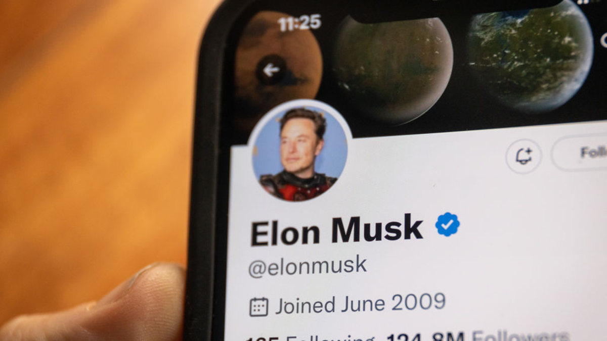 In this photo illustration the Elon Musk's Twitter page is displayed on a smartphone screen