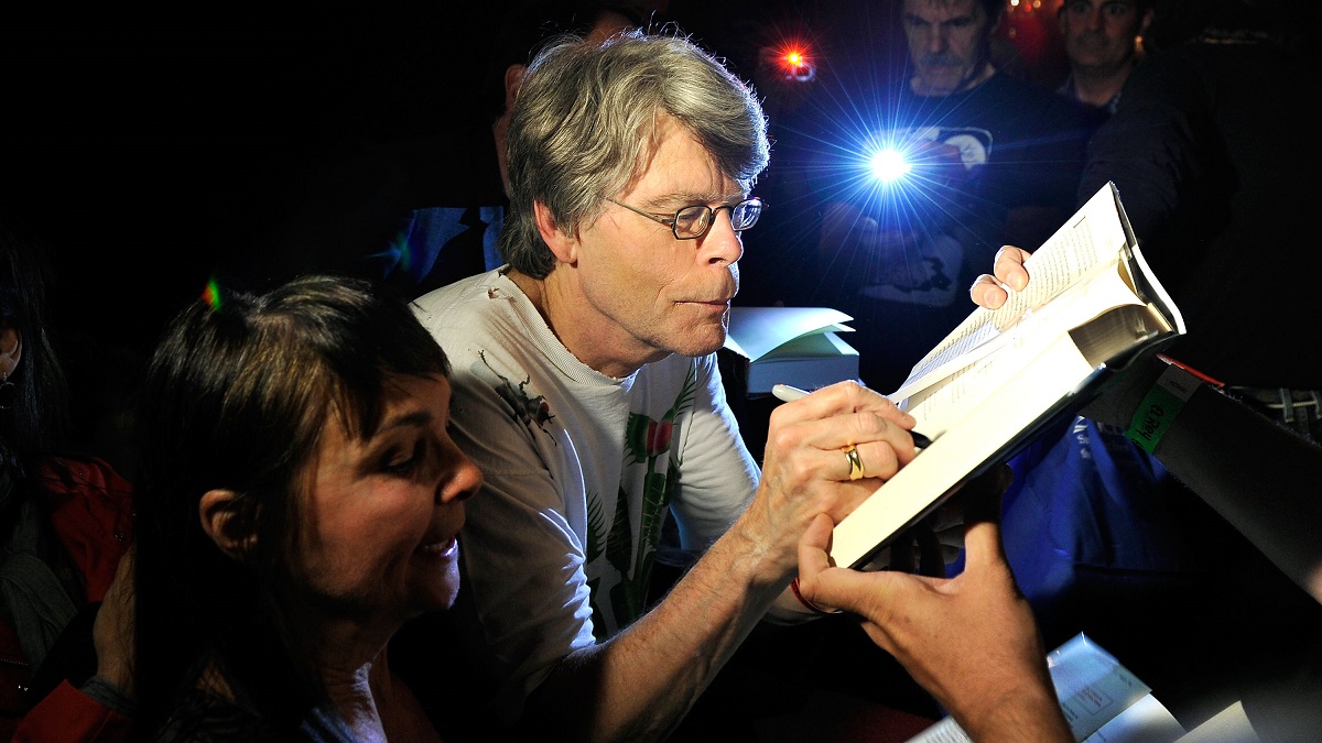 LOS ANGELES, CA - JUNE 22: Author Stephen King signs autographs for fans prior to performing with the Rock Bottom Remainders at El Rey Theatre on June 22, 2012 in Los Angeles, California.