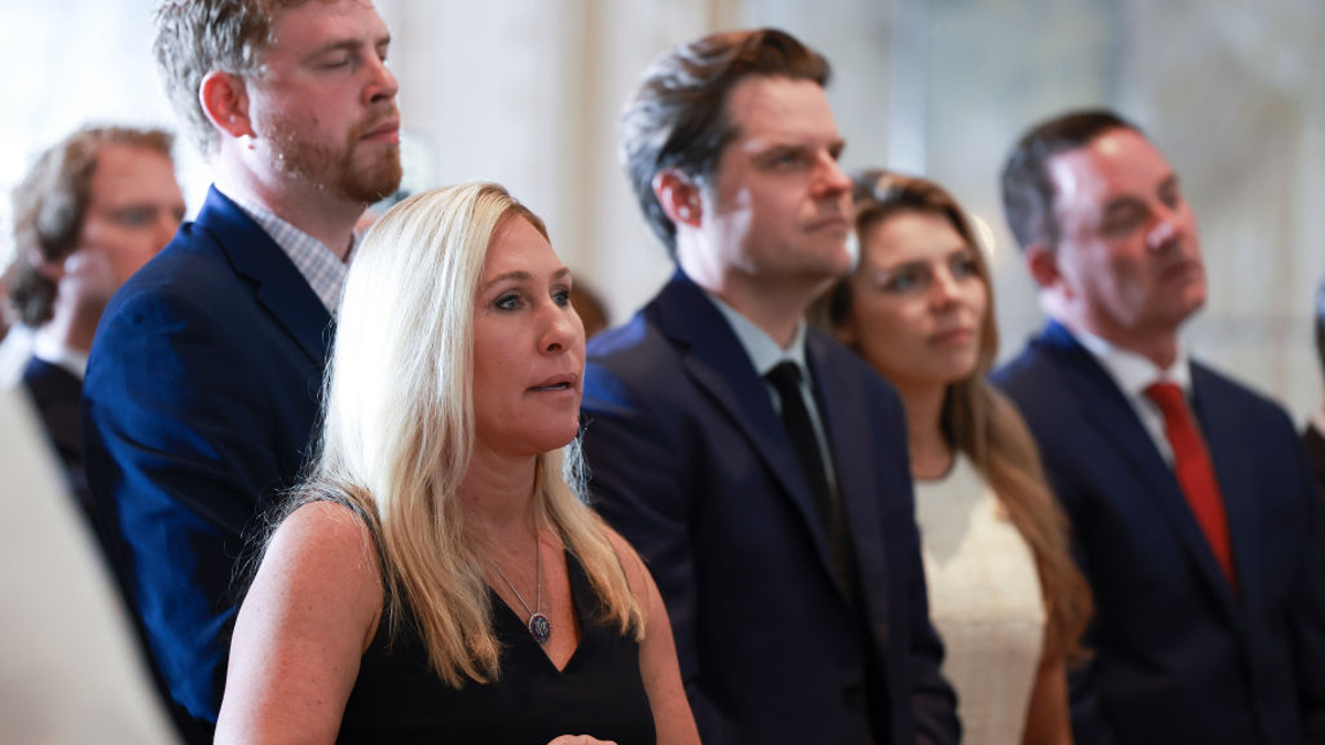 U.S. Reps. Marjorie Taylor Greene (R-GA) and Matt Gaetz (R-FL) (C) listen as former President Donald Trump speaks during an event at Mar-a-Lago April 4, 2023 in West Palm Beach, Florida. Trump pleaded not guilty in a Manhattan courtroom today to 34 counts related to money paid to adult film star Stormy Daniels in 2016, the first criminal charges for any former U.S. president.