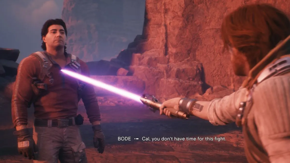 A character holds up a pink light saber at another character Star Wars Jedi: Survivor.