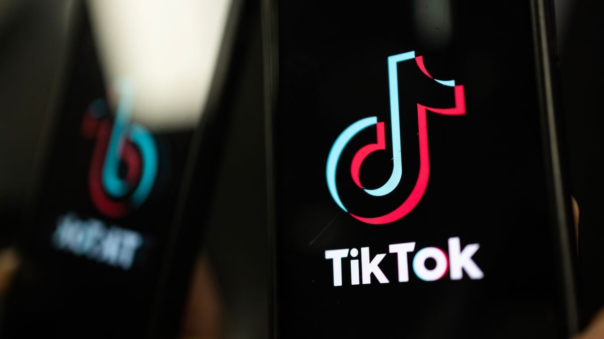 LONDON, ENGLAND - FEBRUARY 28: In this photo illustration, a TikTok logo is displayed on an iPhone on February 28, 2023 in London, England. This week, the US government and European Union's parliament have announced bans on installing the popular social media app on staff devices.