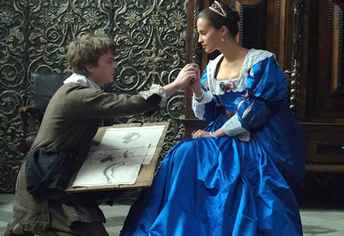Dane Dehaan reaches to touch Alicia Vikander in Tulip Fever