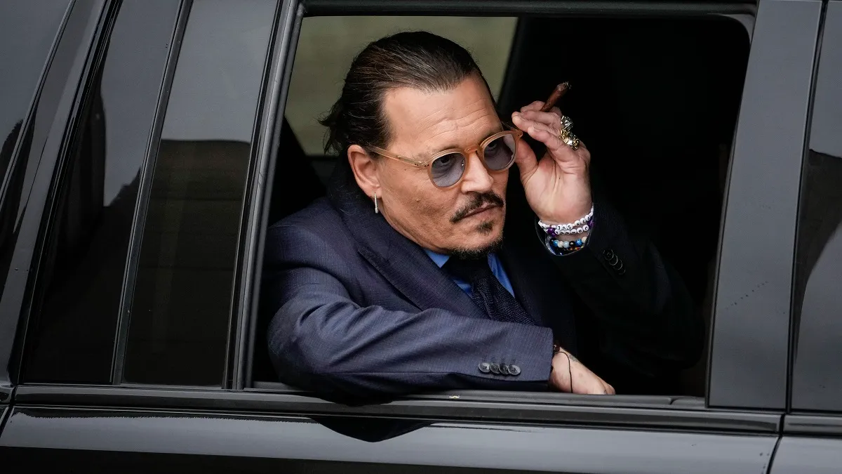 FAIRFAX, VA - MAY 27: Actor Johnny Depp sits in his vehicle as he departs the Fairfax County Courthouse on May 27, 2022 in Fairfax, Virginia. Closing arguments in the Depp v. Heard defamation trial, brought by Johnny Depp against his ex-wife Amber Heard, concluded today and jury deliberations begin. 