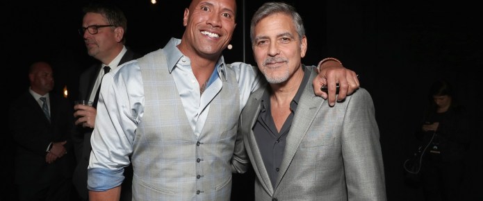 They’re both colossal DC failures, but Dwayne Johnson can at least celebrate beating George Clooney at his own game
