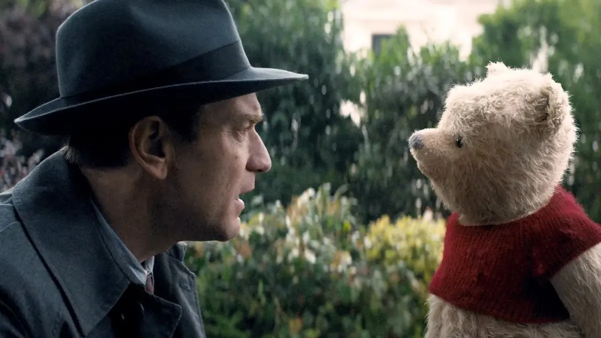 Ewan McGregor as Christopher Robin and Jim Cummings as Winnie the Pooh
