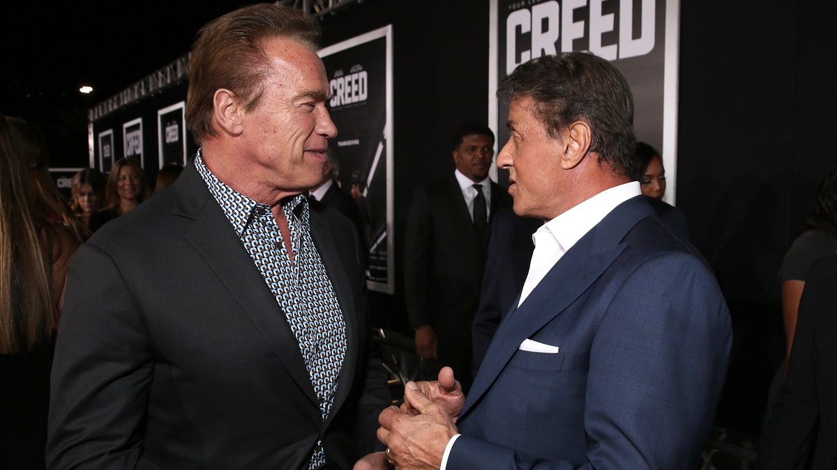 WESTWOOD, CA - NOVEMBER 19: Arnold Schwarzenegger and Producer Sylvester Stallone attend the premiere of Warner Bros. Pictures' "Creed" at Regency Village Theatre on November 19, 2015 in Westwood, California.