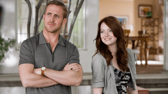 Emma Stone and Ryan Gosling are standing next to each other in Crazy, Stupid Love.