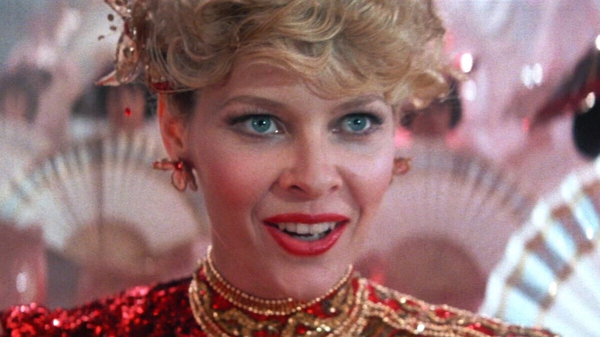 A close-up shot of Willie Scott (Kate Capshaw) from the opening scenes of Indiana Jones and the Temple of Doom. 