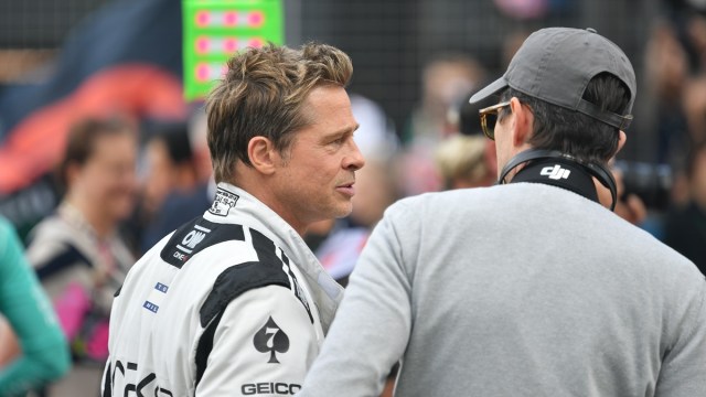 NORTHAMPTON, ENGLAND - JULY 09: Brad Pitt and APEX Film crew on the starting grid during the F1 Grand Prix of Great Britain at Silverstone Circuit on July 09, 2023 in Northampton, England.