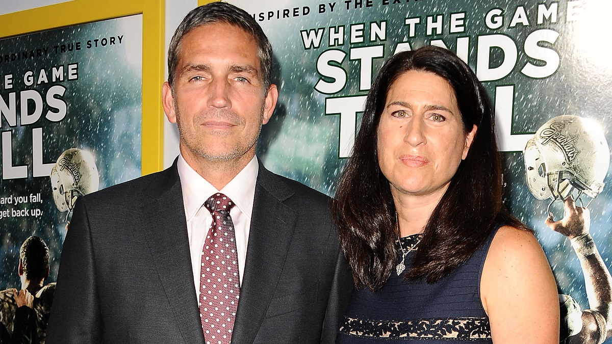 HOLLYWOOD, CA - AUGUST 04: Actor Jim Caviezel and wife Kerri Browitt Caviezel attend the premiere of "When The Game Stands Tall" at ArcLight Hollywood on August 4, 2014 in Hollywood, California.