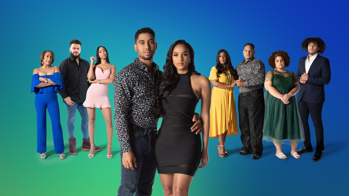 The two families of The Family Chantel cast stand against a blue background