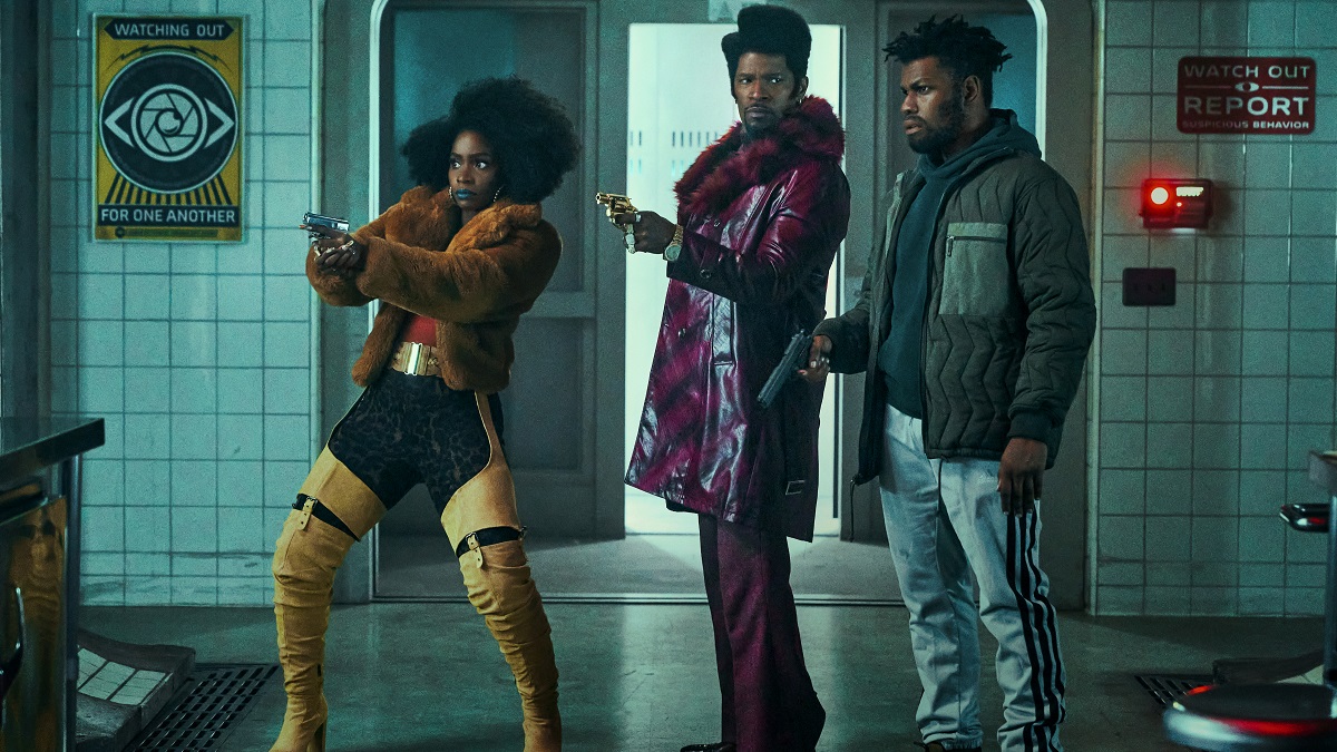 Eles clonaram Tyrone - (da esquerda para a direita) Teyonah Parris como Yo-Yo, Jamie Foxx como Slick Charles e John Boyega como Fontaine em They Cloned Tyrone.