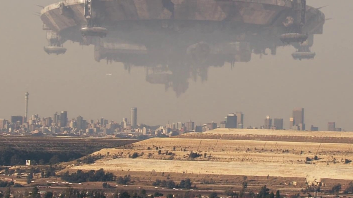 A still from 'District 9,' showing alien spacecraft hovering over earth
