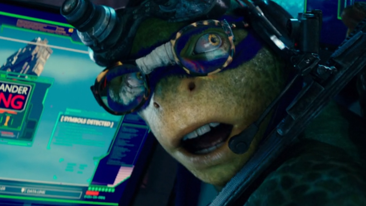 Donatello de "TMNT: Fora das Sombras" pesquisando Krang em um computador