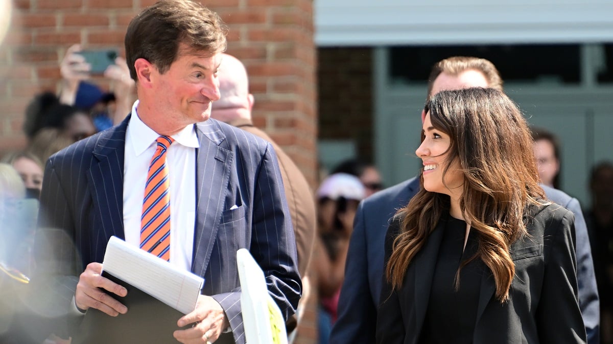 FAIRFAX, VA - JUNE 1: (NY & NJ NEWSPAPERS OUT) Johnny Depp lawyers Benjamin G. Chew, left, and Camille Vasquez, right, look at one-another as they walk to the microphones to make statements outside the Fairfax County Courthouse on June 1, 2022 in Fairfax, Virginia. The jury in the Johnny Depp vs. Amber Heard case awarded Depp $15 million in damages to his career over an op-ed Heard wrote in the Washington Post in 2018.