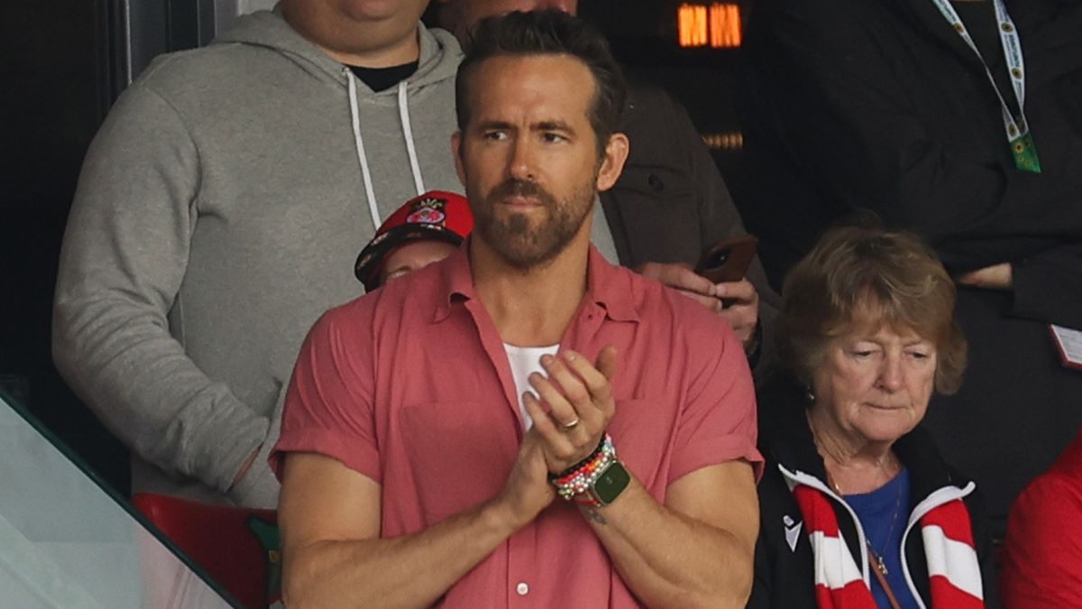 Ryan Reynolds the co-owner of Wrexham watches his team play in their first game back in the Football League during the Sky Bet League Two match between Wrexham and Milton Keynes Dons at Racecourse Ground on August 5, 2023 in Wrexham, Wales. (Photo by Matthew Ashton - AMA/Getty Images)