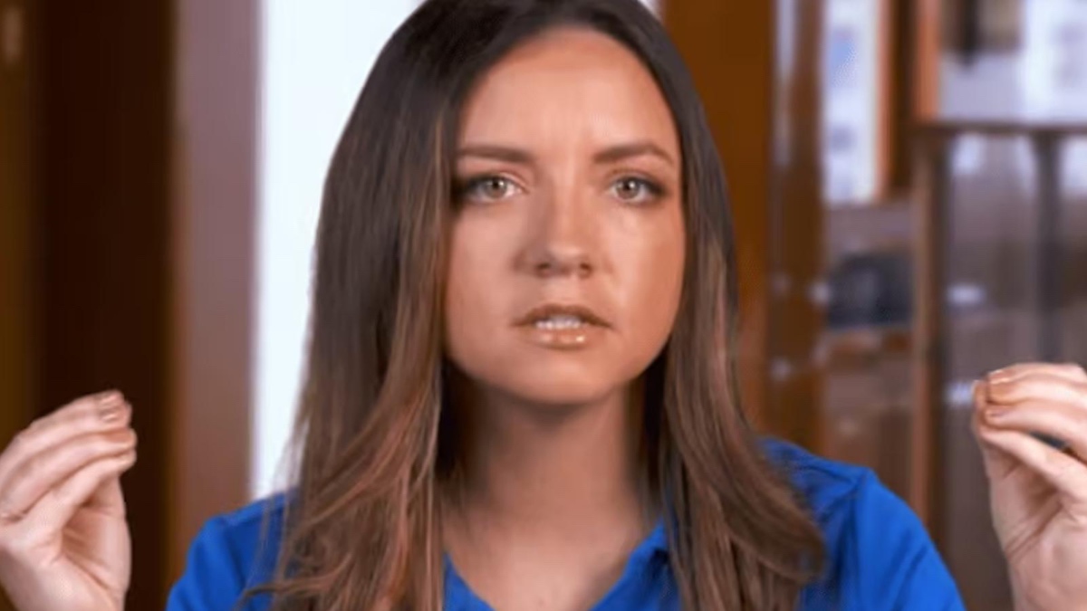 Laura Bileskalne in blue polo shirt in Below Deck confessional