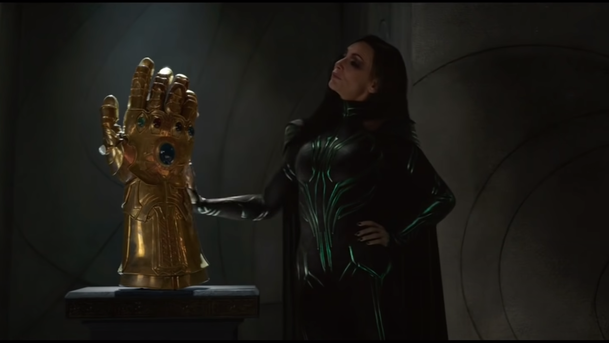 Hela tipping over the fake Infinity Gauntlet