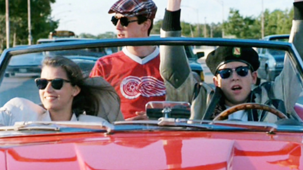 Ferris Bueller, Cameron, and Sloane riding in a convertible 