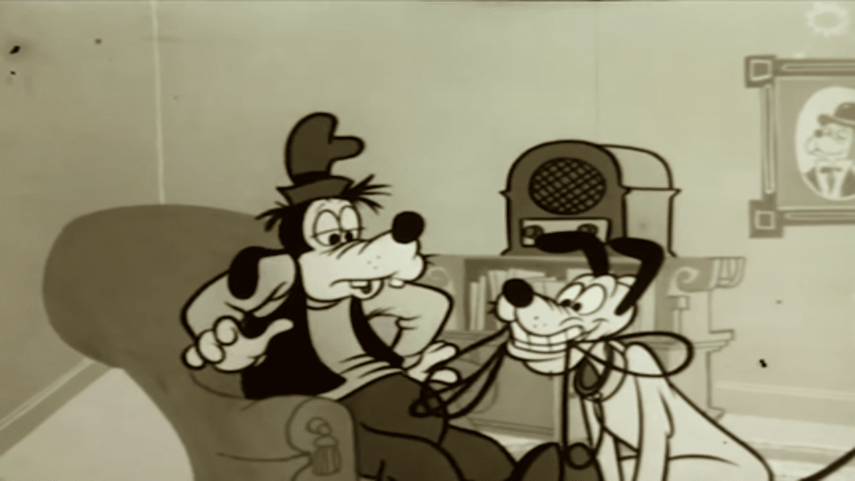 Black and White of Goofy sitting in a chair and Pluto fetching his own leash