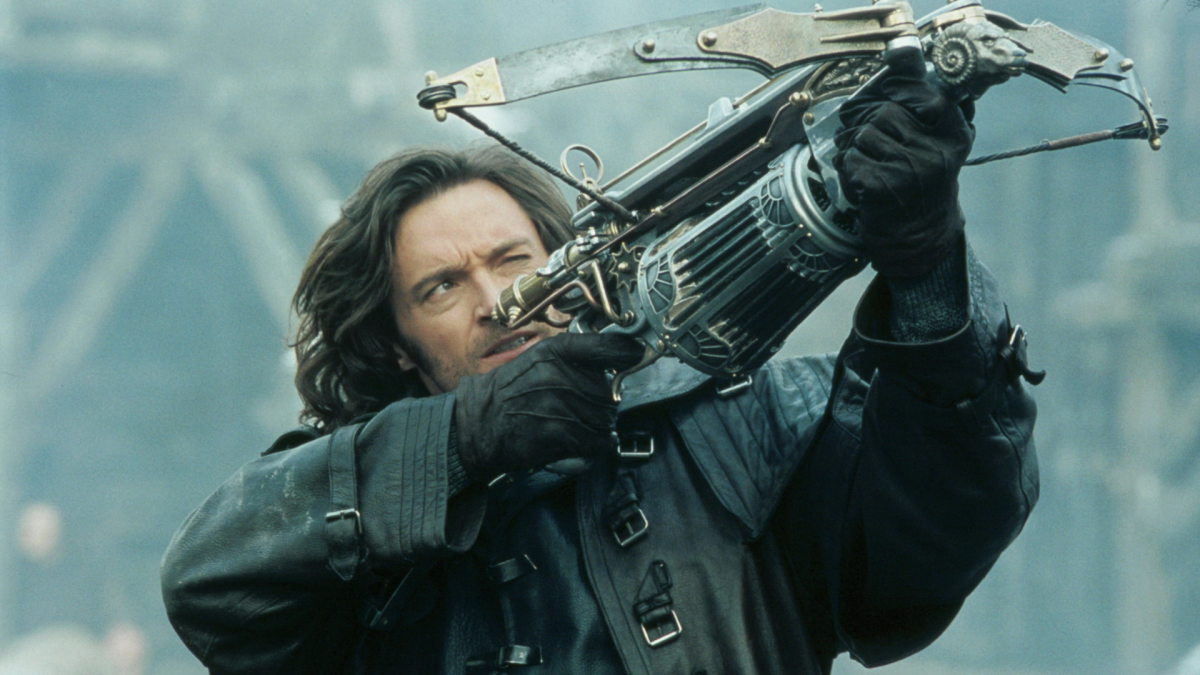 Van Helsing aiming a gas-powered crossbow.