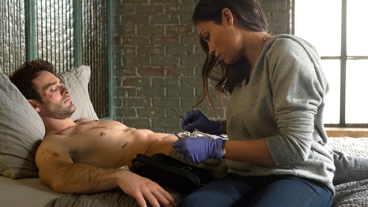 Charlie Cox as Matt Murdock and Rosario Dawson as Claire Temple in 'Daredevil'