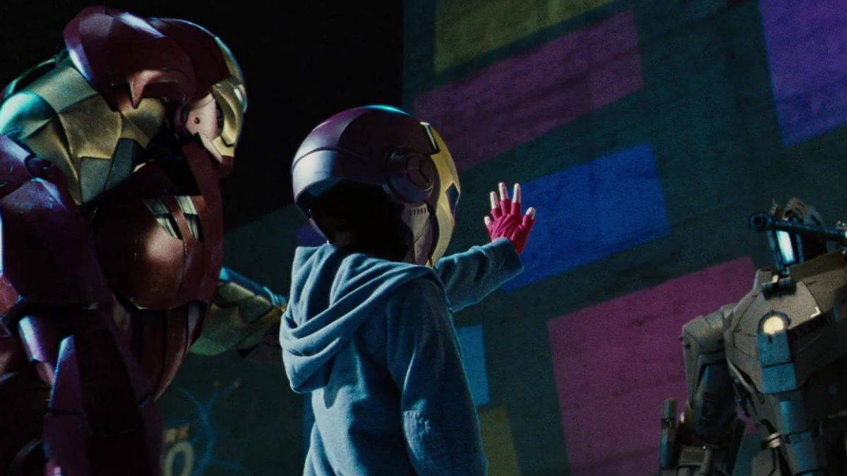 Iron Man and young Peter Parker face off against a drone in "Iron Man 2"