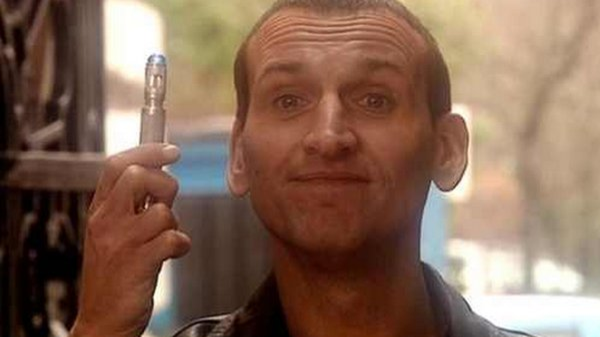 The 9th Doctor holding his sonic screwdriver
