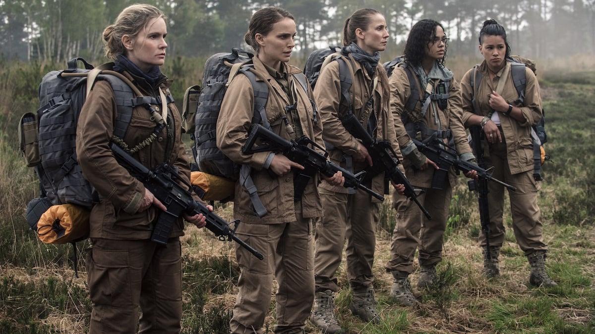 Main cast of 'Annihilation' stand in a line while outfitted in tactical gear