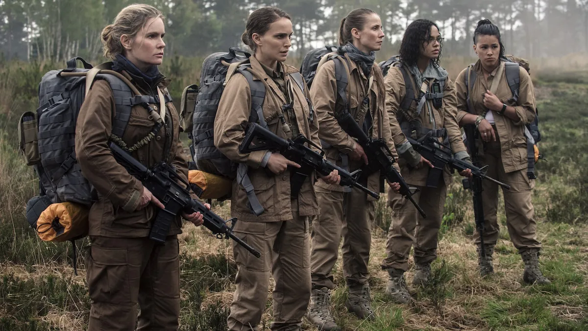 Main cast of 'Annihilation' stand in a line while outfitted in tactical gear