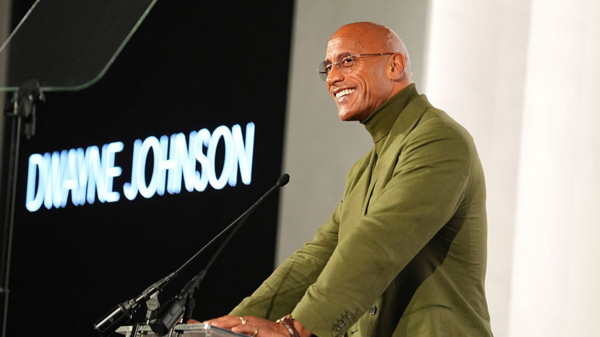 LOS ANGELES, CALIFORNIA - NOVEMBER 17: Dwayne Johnson, wearing Ralph Lauren, speaks onstage during ELLE's 2025 Women in Hollywood Celebration presented by Ralph Lauren and Bvlgari with support from evian, Hendrick's Gin, and Lucid Motors on November 17, 2025 in Los Angeles, California. (Photo by Presley Ann/Getty Images for ELLE)
