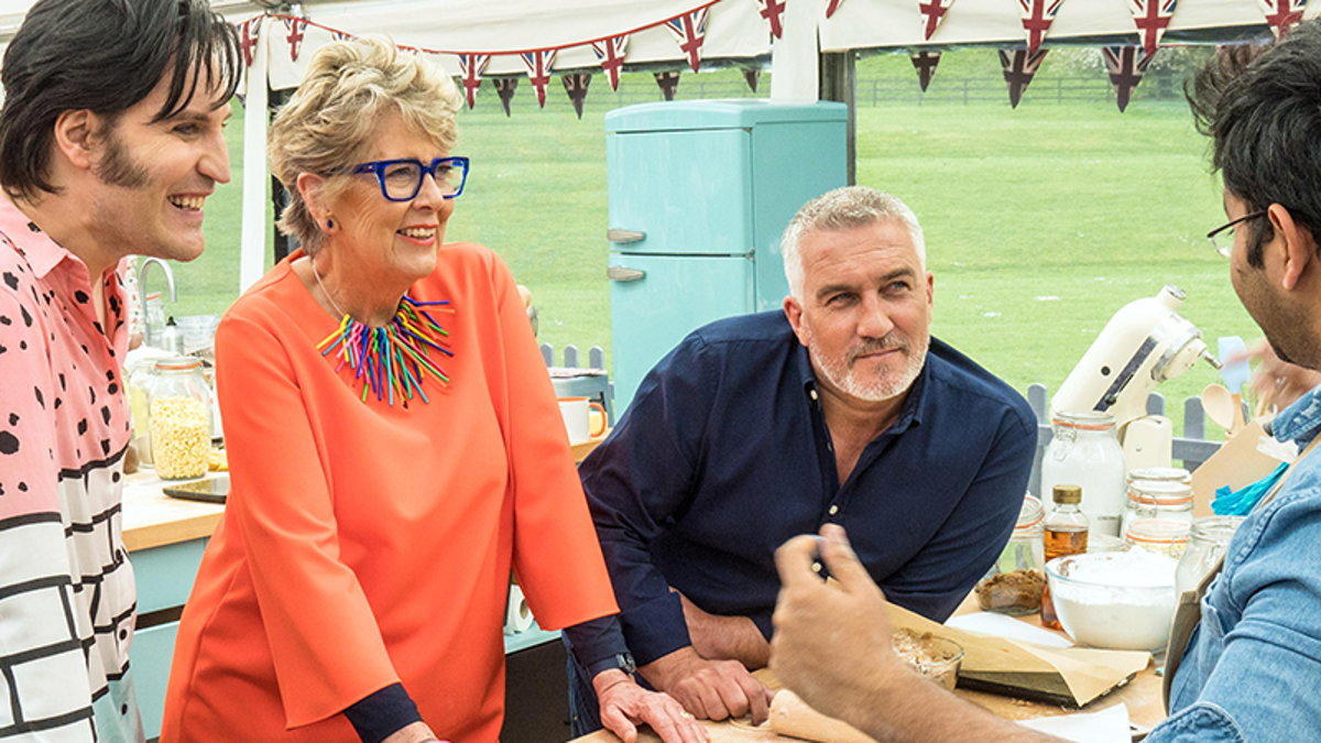 Noel Fielding, Prue Leith, Paul Hollywood, and a contestant on 'The Great British Baking Show' 2023