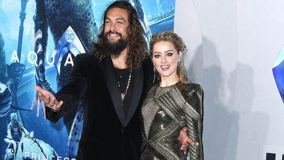 HOLLYWOOD, CA - DECEMBER 12: Jason Momoa, Amber Heard arrives at the Premiere Of Warner Bros. Pictures' "Aquaman" at TCL Chinese Theatre on December 12, 2018 in Hollywood, California.
