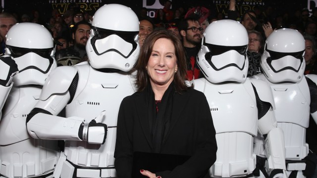HOLLYWOOD, CA - DECEMBER 14: Lucasfilm President Kathleen Kennedy poses with Stormtroopers at the Premiere of Walt Disney Pictures and Lucasfilm's "Star Wars: The Force Awakens" at on December 14, 2015 in Hollywood, California.