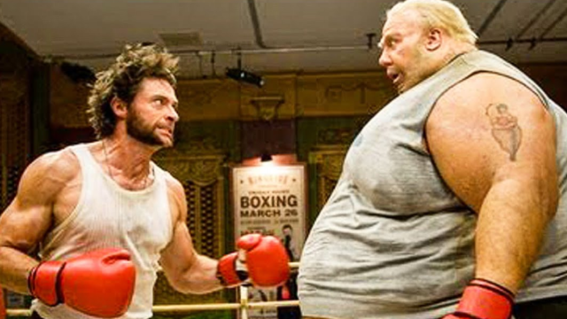Hugh Jackman as Wolverine boxing with Kevin Durand as The Blob